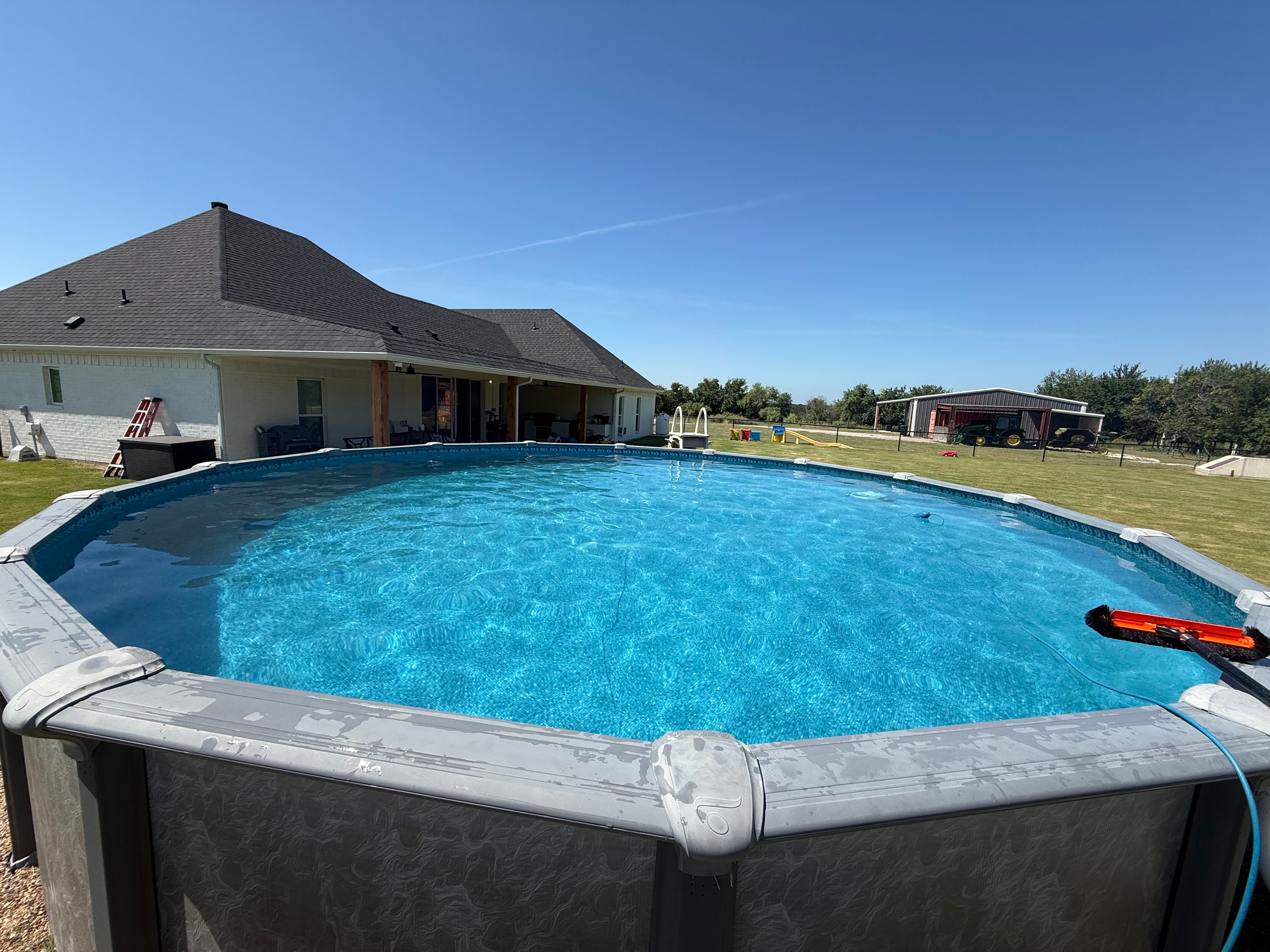 Above ground pool with ladder