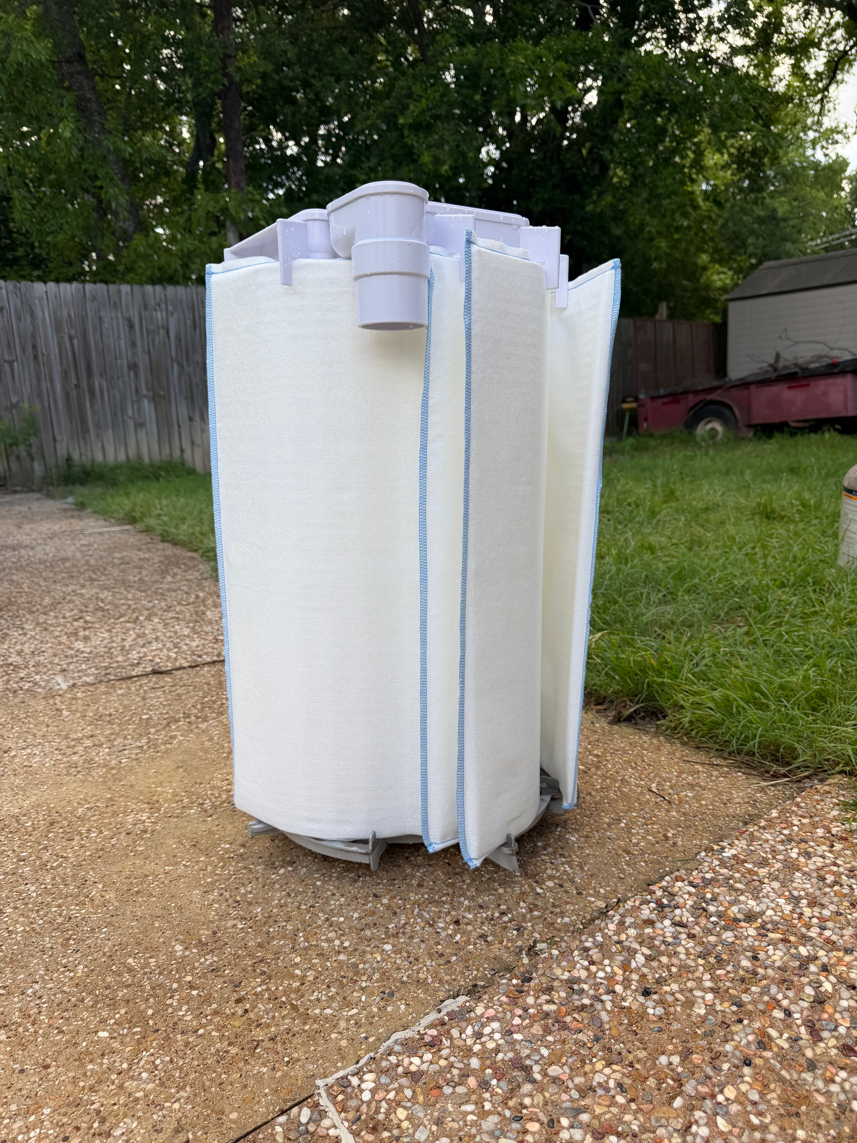 Brand new white pool filter cartridges ready for installation after replacement