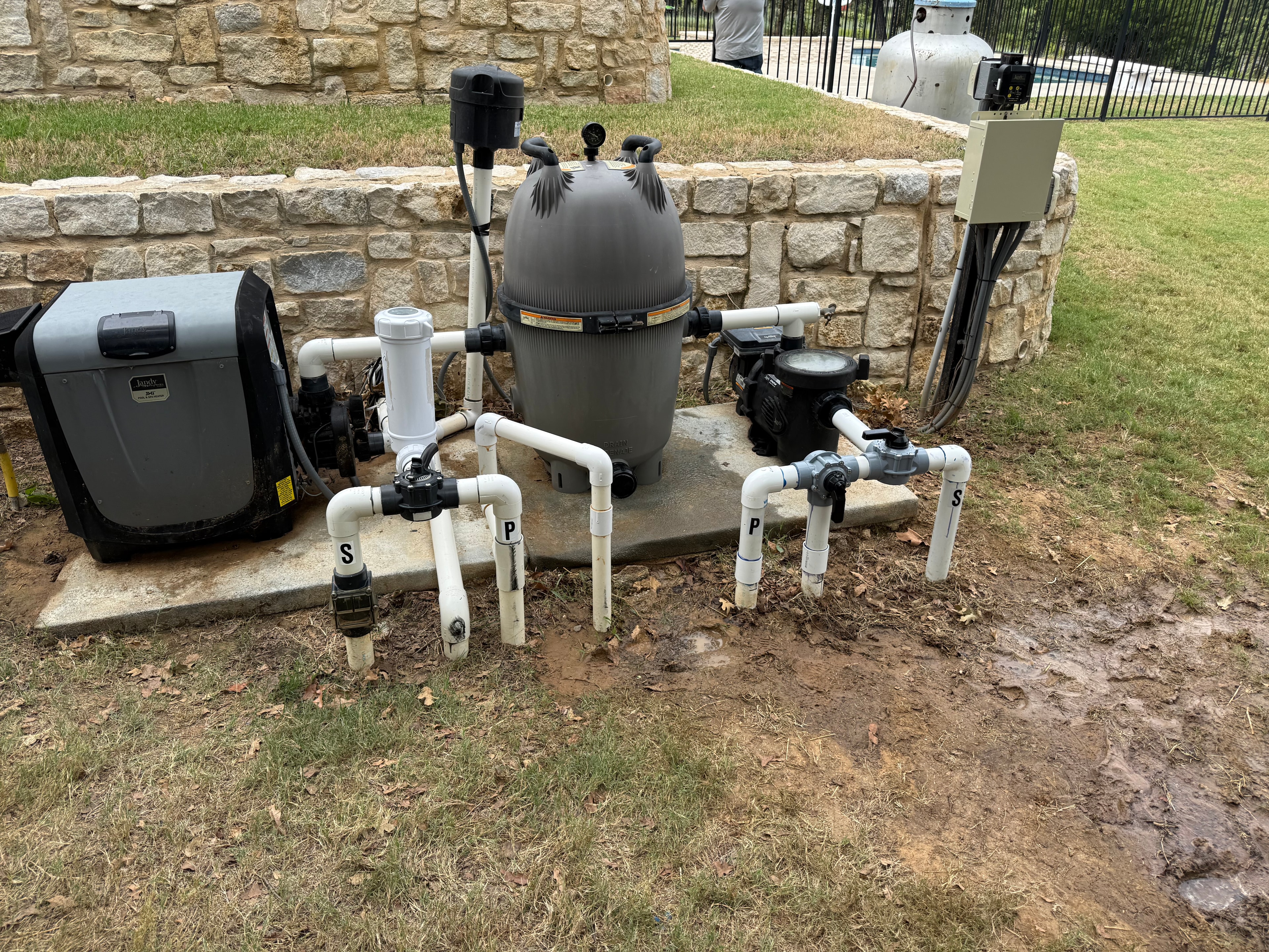 Completed pool pump and plumbing system fully installed and labeled
